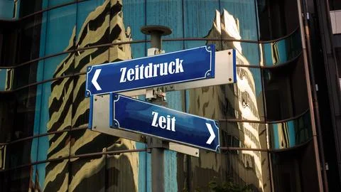 Signposts the direct way to time versus time pressure Stock Photos