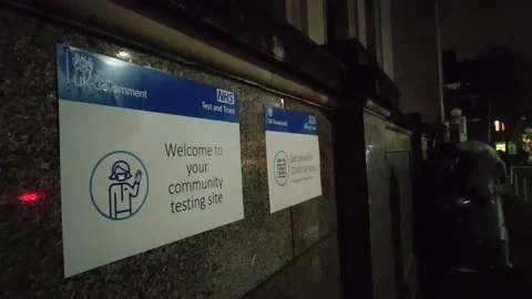 SIGNS AT COVID-19 TESTING AT SAME DAY SITE LONDON UK 4K Stock Footage 145421566