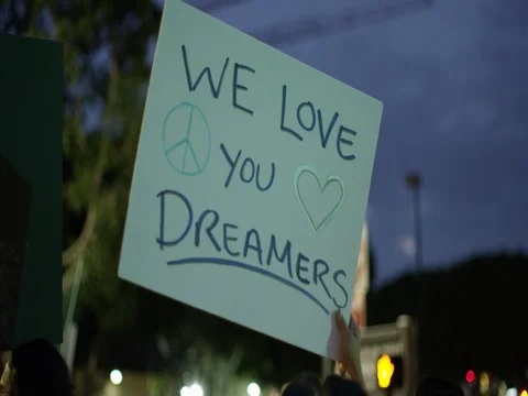 Signs at the DACA march in downtown Los Angeles, California. Stock Footage