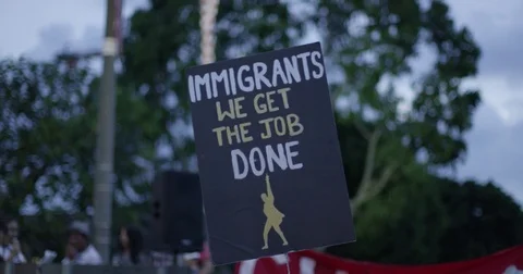 Signs at the DACA march at Echo Park Lake. Los Angeles, California. Stock Footage 81575007