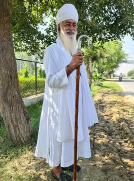 Sikh old man looks to camera Stock Photos