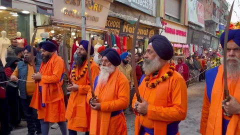 Sikh procession celebrating Guru Gobind Singh Jayanti Stock Footage 299792038