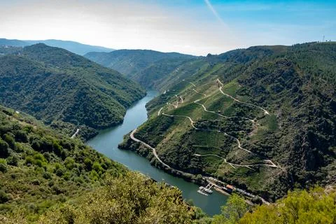 Sil River flows gracefully through the canyon. A valley surrounded by mountai Stock Photos