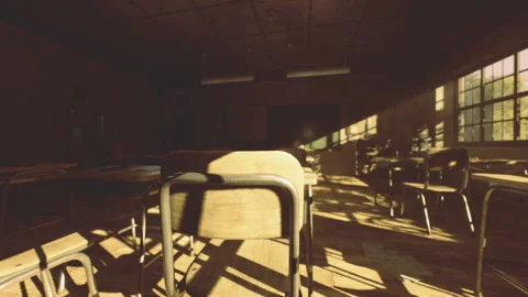 Silent classroom with sunlight streaming through windows and empty desks Stock Footage 336433086