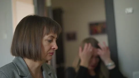 Silent evaluation emphasizing careful listening. Evaluation performed in serene Stock Footage 346550909