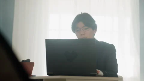 Silent home office environment. Developer engaged in remote coding session 스톡 동영상 337233122