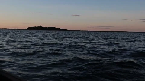 The silent landscape of waves lake during the sunset time Stock Footage 198619048
