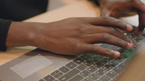Silent night session with hands typing carefully on keyboard. Developer Stock Footage 333182714