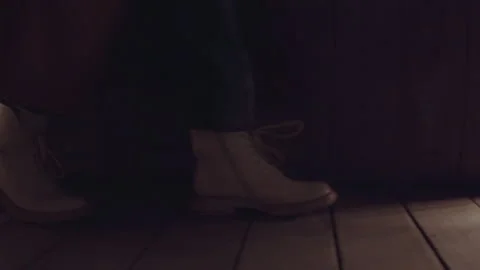 Silent old attic. Wanderer explores abandoned rustic attic room. Solitary figure Stock Footage 341769276