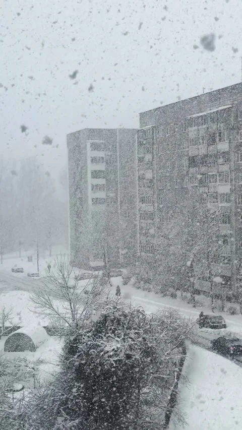 Silent Snowfall Transforms Cityscape Into Peaceful Winter Tableau Stock Footage 327810038