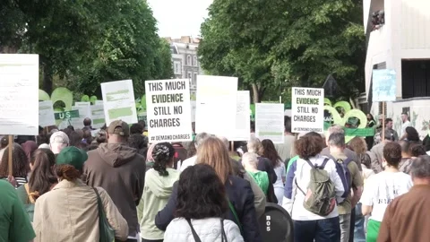 Silent walk begins in memory of Grenfell Tower fire on its ninth anniversary Stock Footage 336922233
