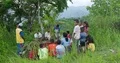 Silent worship at a small graveyard in Flores jungle mountains Indonesia 4k or 4k+ Resolution