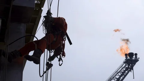 Silhouette Abseiler Working At Height. Stock Footage 129638184