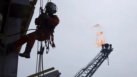 Silhouette Abseiler Working At Height. Stock Footage 129638473