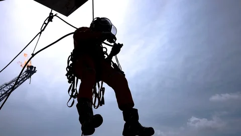 Silhouette Abseiler Working At Height. Stock Footage 129638593