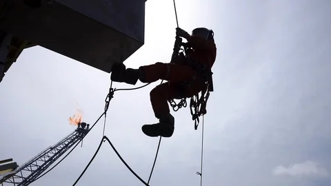 Silhouette Abseiler Working At Height. Stock Footage 129638962