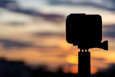 Silhouette Action camera in front of the twilight sky, Technology and Nature  写真素材