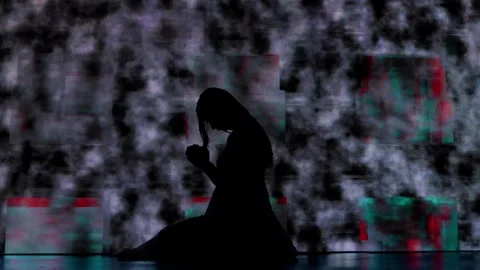 Silhouette against digital television screen. Thriller scene scared woman Stock Footage 265567963