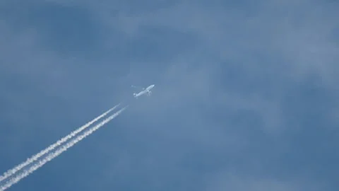 Silhouette of an airplane in the sky Video stock 166741030