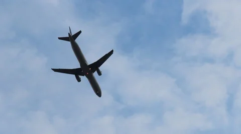 Silhouette of an airplane taking off Stock Footage 50405550