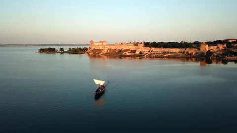 Silhouette of the ancient sailing ship at sunset aerial Stock-Footage 127111658