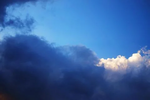 Silhouette and cloud in sunset and golden sunlight Illuminating on blue sky Stock Photos