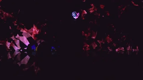 Silhouette of anonymous hacker on the abstracts background rises his hand Stock Footage 169404372