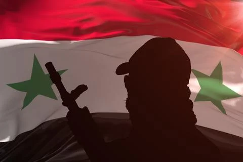 Silhouette of an armed man with a machine gun against the background of the S 스톡 사진