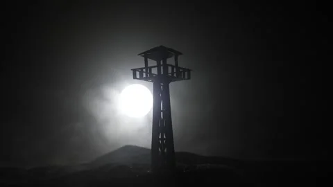 silhouette-army-watchtower-night-footage-151696116_iconl.jpeg