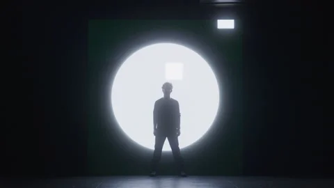 Silhouette Artificial Intelligence Stands in Strobing Light During Test in Dark Stock Footage 211880806