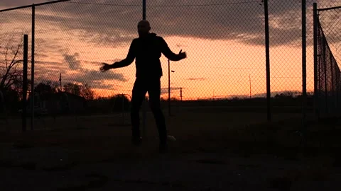 Silhouette Of Athlete Training At Dawn Stock Footage 229059783
