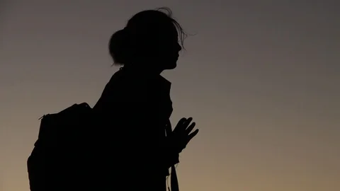 Silhouette of backpacker by the beach Stock Footage 123202067