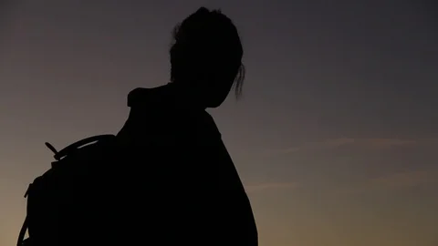 Silhouette of backpacker Stock Footage 123143171