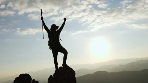 Silhouette of backpacker on mountain  and sun light background,business, su.. Stock Footage 336933453