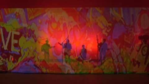 Silhouette of a band practicing and performing on stage Stock Footage 112333055