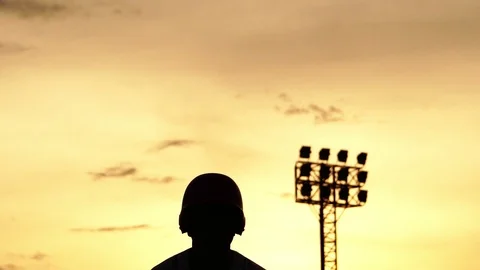 Silhouette Baseball athletes are training hard with the sunset Vídeos de archivo 112139411