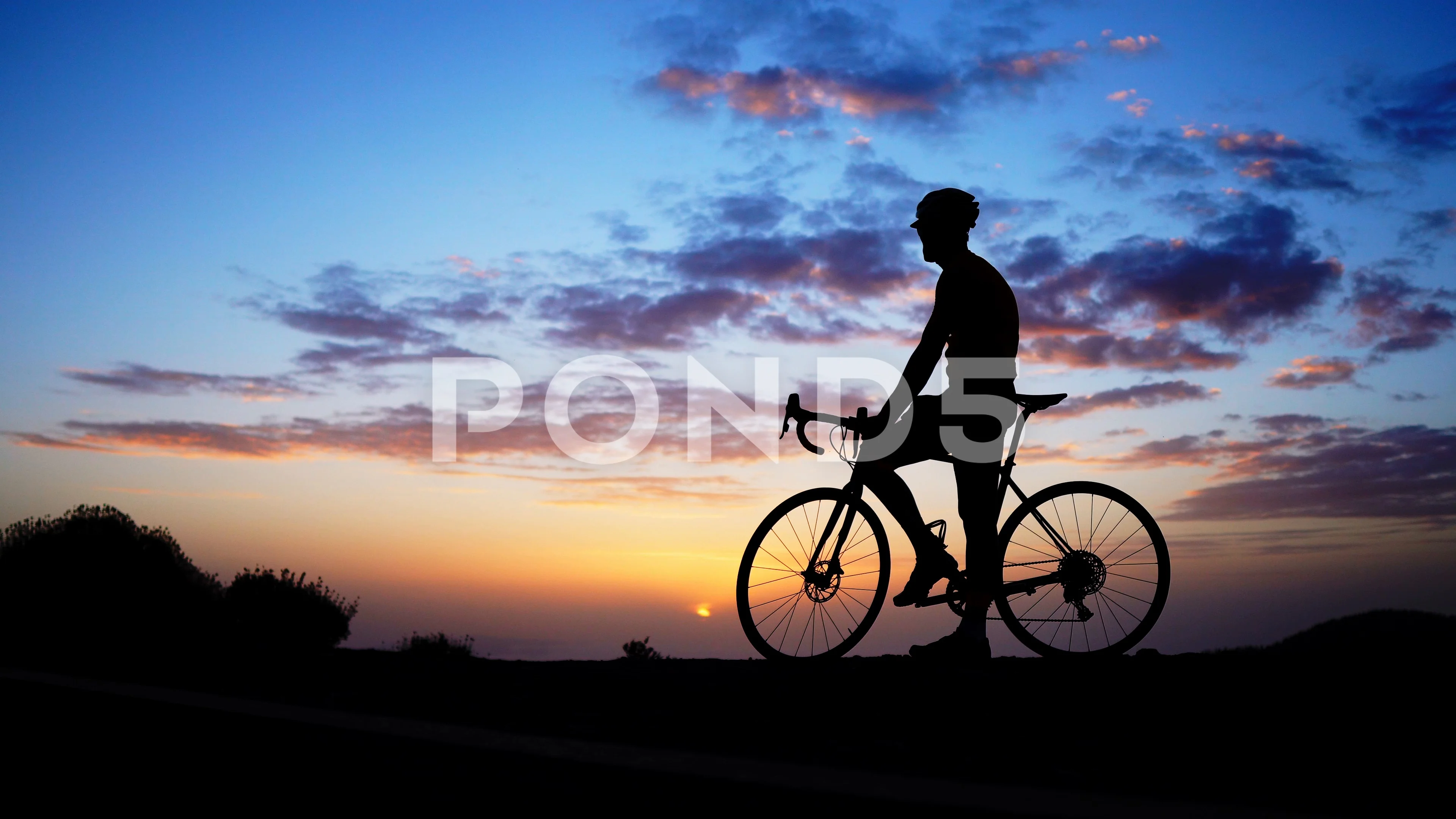 Silhouette Of Bicycle Rider On A Rock At Stock Video Pond5