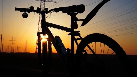 Silhouette of a bicycle at sunset. Stock Footage 88731655
