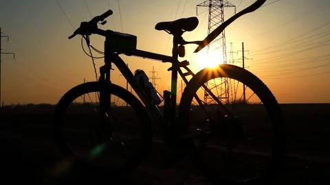 Silhouette of a bicycle at sunset. Stock Footage 88731989