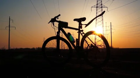 Silhouette of a bicycle at sunset. Stock Footage 88732208