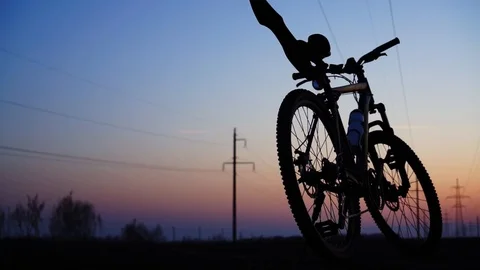 Silhouette of a bicycle at sunset. Stock Footage 88732246