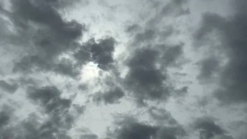 Silhouette Birds Flying, Moving Clouds And A Hole Of Clouds With Light Stock Footage 283750461