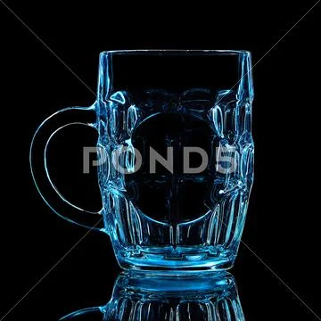 Silhouette of blue beer glass with clipping path on black background Stock Photos