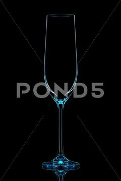 Silhouette of blue champagne glass on black Stock Photos