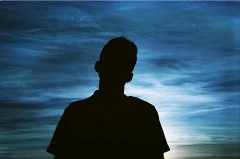 Silhouette with Blue Clouds Foto stock
