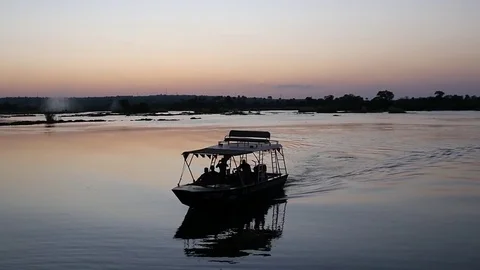 Silhouette of Boat at Sunset Stock Footage 77796249