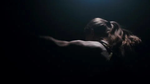 Silhouette of a boxer practicing a quick strike shadow boxing fight Stock-Footage 274450162