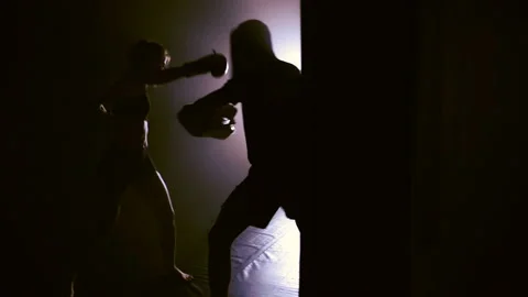 Silhouette of boxing training in smoke Stock Footage 88729658