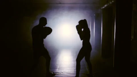 Silhouette of boxing training in smoke Stock Footage 89375003