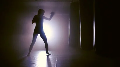 Silhouette of Boxing training in smoke Stock Footage 89375206